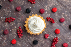 π Raspberry Dream Swig: The Creamy Pink Drink Everyone Loves 5 top view creamy delicious cake along with differented berries spread all brown berry fruit cream bake biscuit